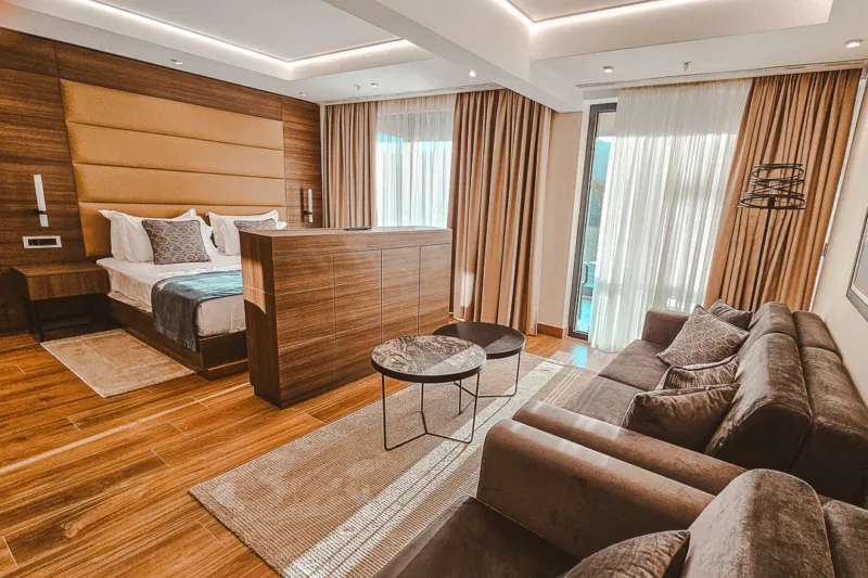 hotel de andros room interior, bed, tables and sofa