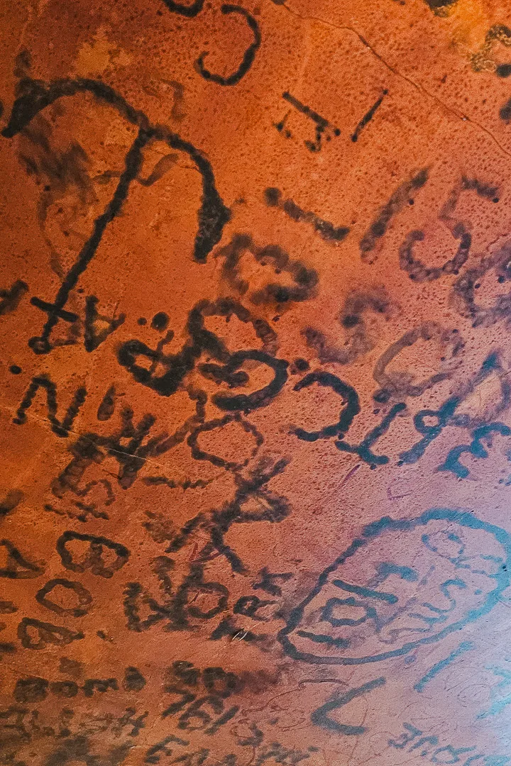 Burnt names in the ceiling of the Eagle pub, Cambridge